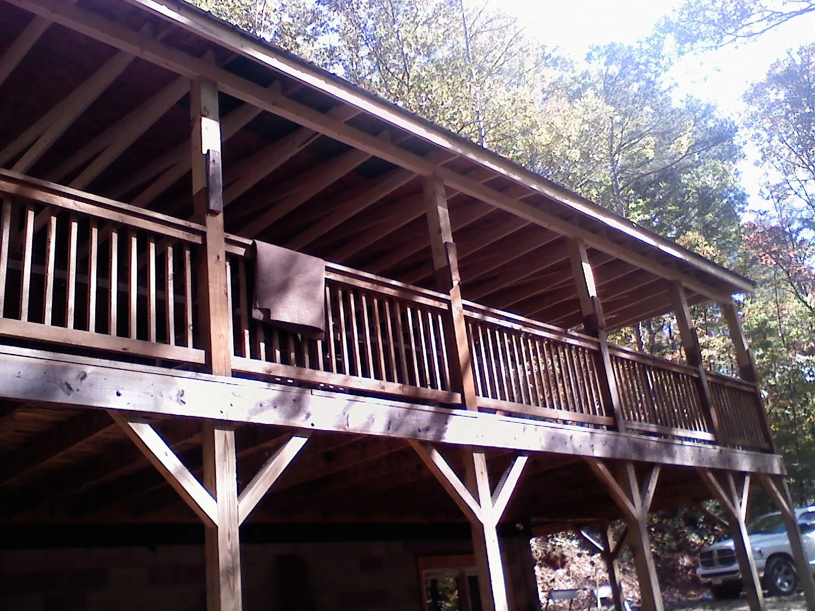 Timber framing under a new elevated porch and deck — Roof Leak Repair in Wever by Roofing Brothers